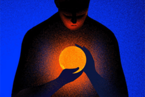 Silhouette image of person holding a glowing orange ball.