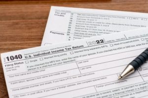Picture of tax forms on a desk