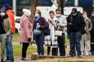 People line up to receive coronavirus tests in Washington, D.C., in December 2021. A new paper published in Science is warning about the potential risks of biological AI models. (Ting Shen/Xinhua via Getty Images)