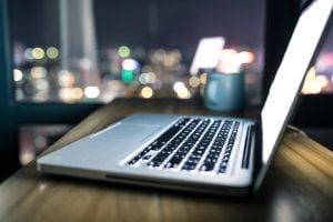 Laptop on table at night