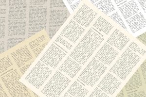 background of pages of vintage newspapers