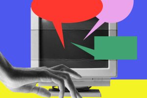 A hand types over a keyboard as empty cartoon speech bubbles come out of the computer.
